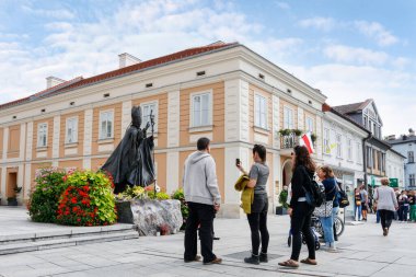 People are queuing to visit the museum of John Paul II in Wadowice, Poland. clipart