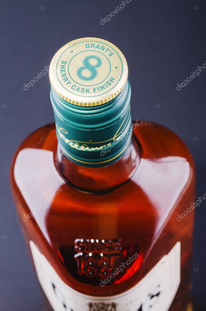 Grants blended whisky on gradient background.  Grants has been produced by William Grants and sons in Scotland since 1887
