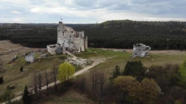 Arial view on a historic castle in Mirow. Jura Cracow. Poland - 05.2020. 4K, UHD, Cinematic