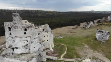 Arial view on a historic castle in Mirow. Jura Cracow. Poland - 05.2020. 4K, UHD, Cinematic