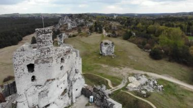Arial view on a historic castle in Mirow. Jura Cracow. Poland - 05.2020. 4K, UHD, Cinematic