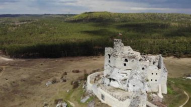 Arial view on a historic castle in Mirow. Jura Cracow. Poland - 05.2020. 4K, UHD, Cinematic
