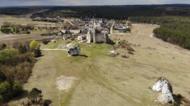 Arial view on a historic castle in Mirow. Jura Cracow. Poland - 05.2020. 4K, UHD, Cinematic