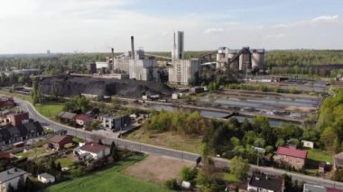 Coal mine. Houses in the background. 4K, UHD, 50p, Cinematic,