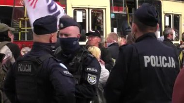 Katowice / Poland - 10.10.2020. The March anti Covid-19. People without masks move around the city. 4K, UHD, 50p, Cinematic.