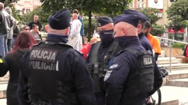 Katowice / Poland - 10.10.2020. The March anti Covid-19. People without masks move around the city. 4K, UHD, 50p, Cinematic.