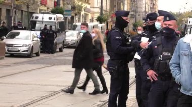 Katowice / Poland - 10.10.2020. The March anti Covid-19. People without masks move around the city. 4K, UHD, 50p, Cinematic.