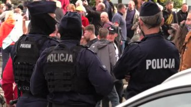 Katowice / Poland - 10.10.2020. The March anti Covid-19. People without masks move around the city. 4K, UHD, 50p, Cinematic.