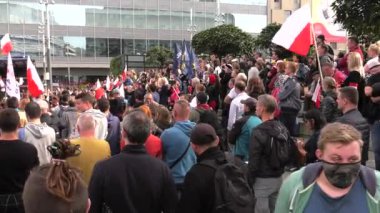 Katowice / Poland - 10.10.2020. The March anti Covid-19. People without masks move around the city. 4K, UHD, 50p, Cinematic.