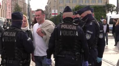 Katowice / Poland - 10.10.2020. The March anti Covid-19. People without masks move around the city. 4K, UHD, 50p, Cinematic.