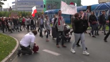 Katowice / Poland - 10.10.2020. The March anti Covid-19. People without masks move around the city. 4K, UHD, 50p, Cinematic.