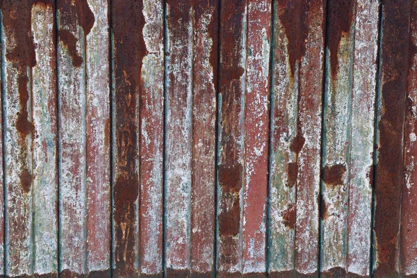 五颜六色的锈迹斑斑的金属铁板磨墙背景表面 — 图库照片