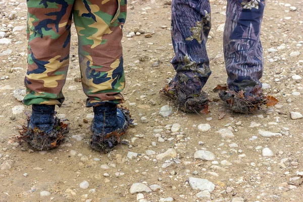 Shoes after overcoming mud areas.