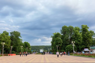  Maikop Region Adigeya,Russian Federation,05.19.2018 : Walking in the summer Park in the evening. clipart