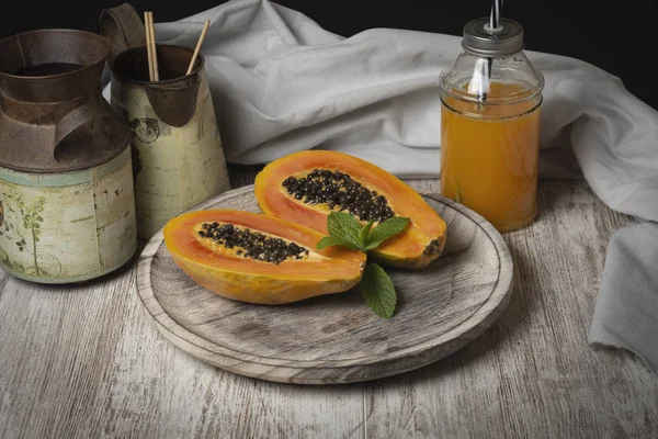 Papaya juice in rustic atmosphere - image