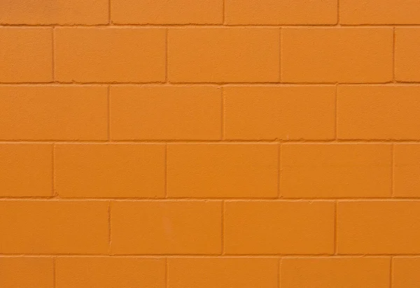 Pared de ladrillo pintado de naranja textura y fondo - imagen —  Fotos de Stock