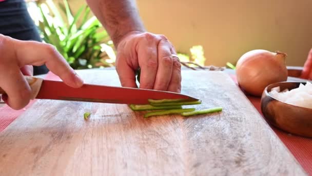 Chef Cuts Green Pepper Wooden Board — Stock Video