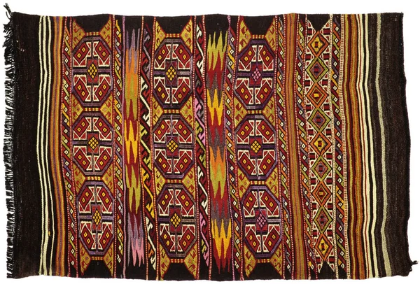 Rugs, carpets and pillows, hand-made, reflecting local culture.