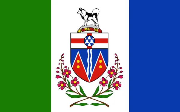ユーコン準州の旗はカナダの3つの連邦地域の中で最西端で最も小さい ホワイトホースは州都であり ユーコン州唯一の都市である — ストック写真