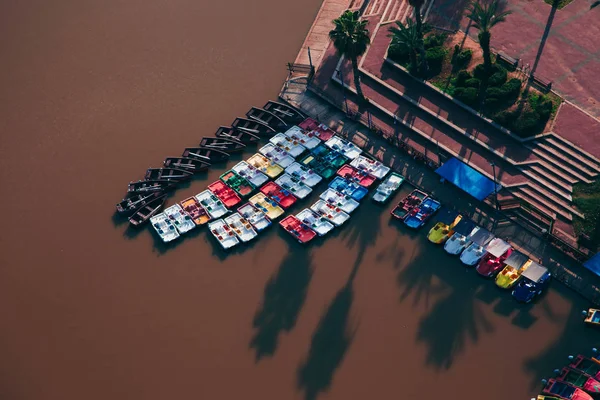 Bird-eye view of bunder with boats in park pond, Tel Aviv, Israel