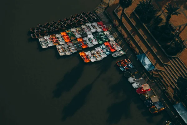 Bird-eye view of bunder with boats in park pond, Tel Aviv, Israel