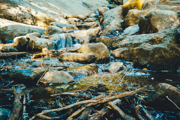 Close view of rocky waterflow in Central Park, New York, USA