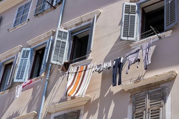 stock image Historical building and clothesline in the old town of Rovinj in Croatia