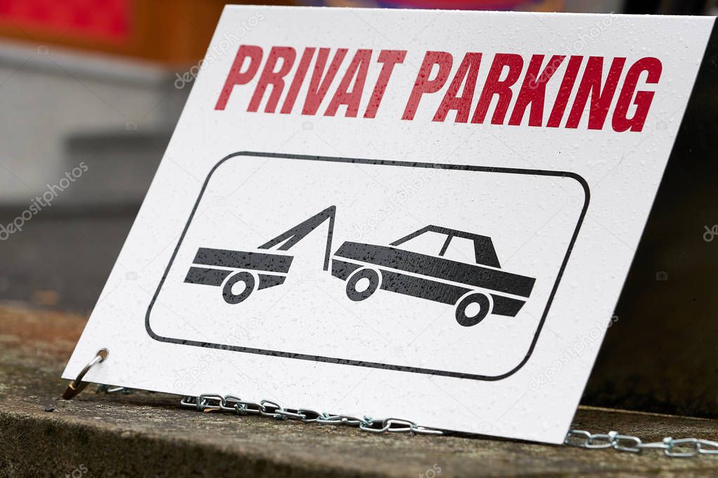 Sign on a private parking lot in the city center of Karlovy Vary in the Czech Republic                               