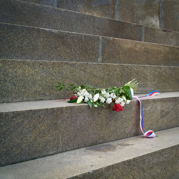 Flowers commemorating the suppression of the Prague Spring at the monument of St. Wenceslas in Prague.