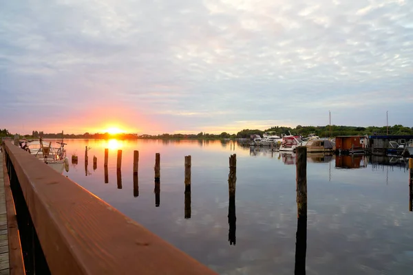 Evening mood with sunset at a boat landing stage in Toeplitz an der Havel in Germany