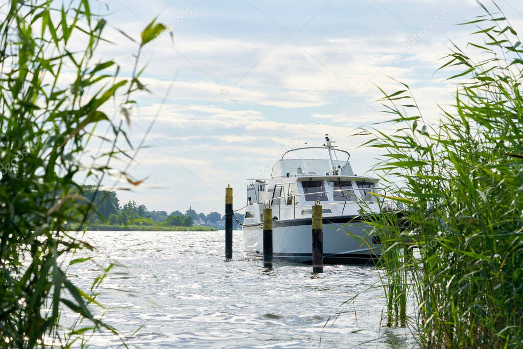 Yacht at a pier on the river Havel near Toeplitz in Germany                               