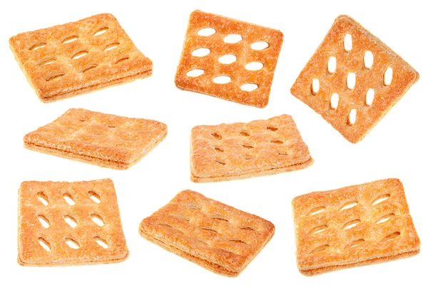 Conjunto Galletas Perforadas Cuadradas Aisladas Sobre Fondo Blanco —  Fotos de Stock