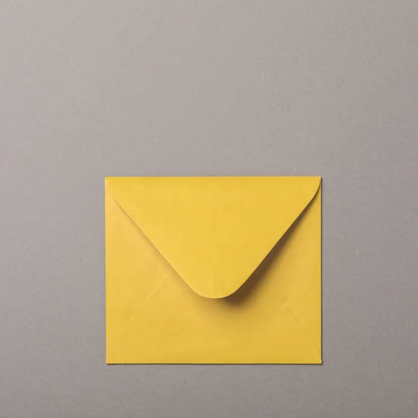 Small Yellow Envelope Gray Background — Stock Photo, Image