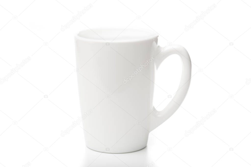 White ceramic mug. Isolated on a white.