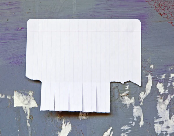 Blank white paper with tear off tabs. — Stock Photo, Image