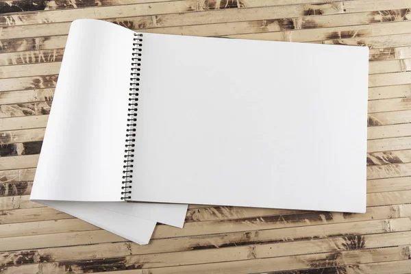 Top view notebook on wooden texture — Stock Photo, Image