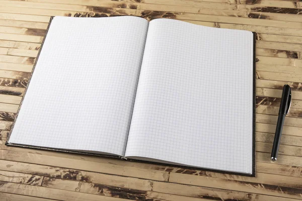 Notebook vista dall'alto su texture in legno — Foto Stock