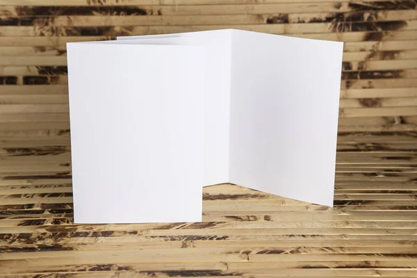 Mockup of white booklet on bamboo background. — Stock Photo, Image