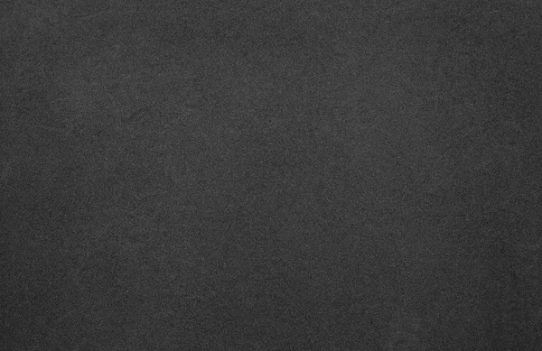 Tekstur kain hitam sebagai latar belakang . — Stok Foto