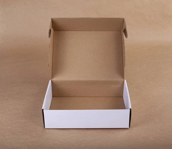 Opened white cardboard box