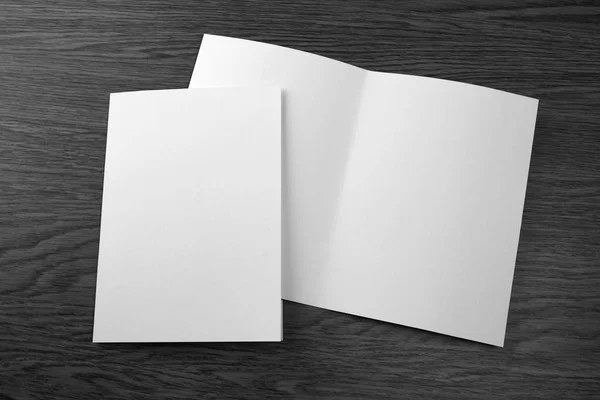 Mockup of white booklet on wooden background. — Stock Photo, Image