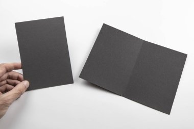 Mens el holding siyah kitapçık