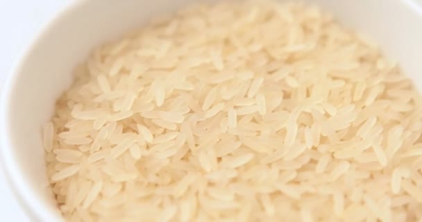 鍋に米の穀物の回転 — ストック動画