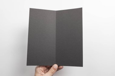 Mens el holding siyah kitapçık