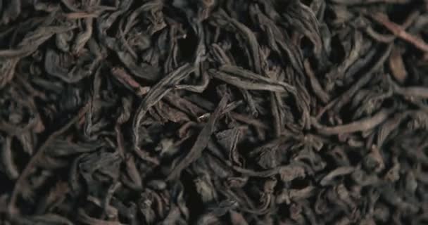 Schwarzer Tee Blätter Nahaufnahme Von Oben Schleifenrotation — Stockvideo