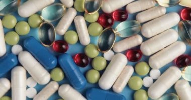 Tıp çok renkli mavi arka plan rotasyon hap