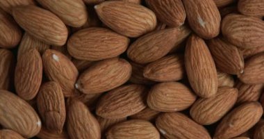 Dönen soyulmuş badem arka plan, 4k 