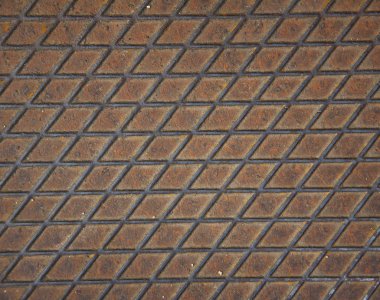 Rhombus süsleme ile metal plaka.