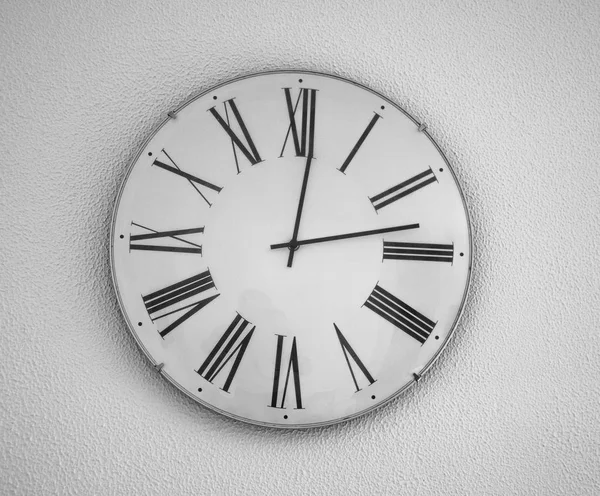 Wall clock with the Roman figures — Stock Photo, Image