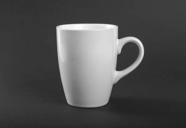 Empty white mug on a gray background. — Stock Photo, Image